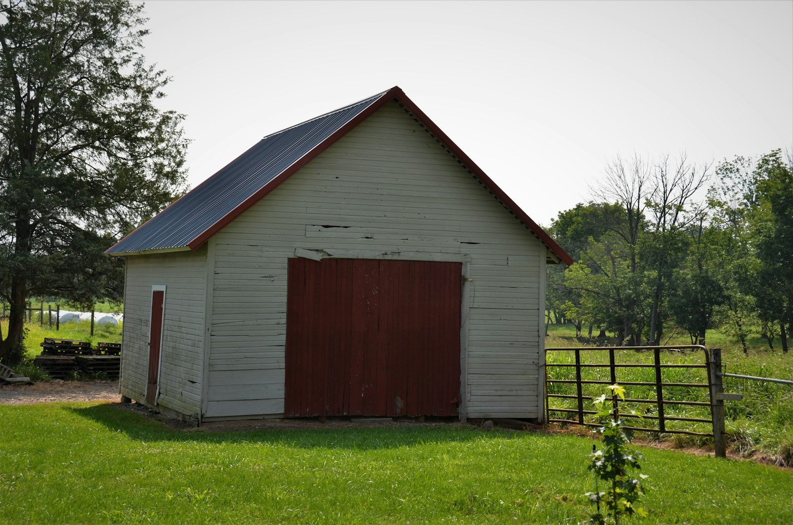 brown wooden house on green grass field